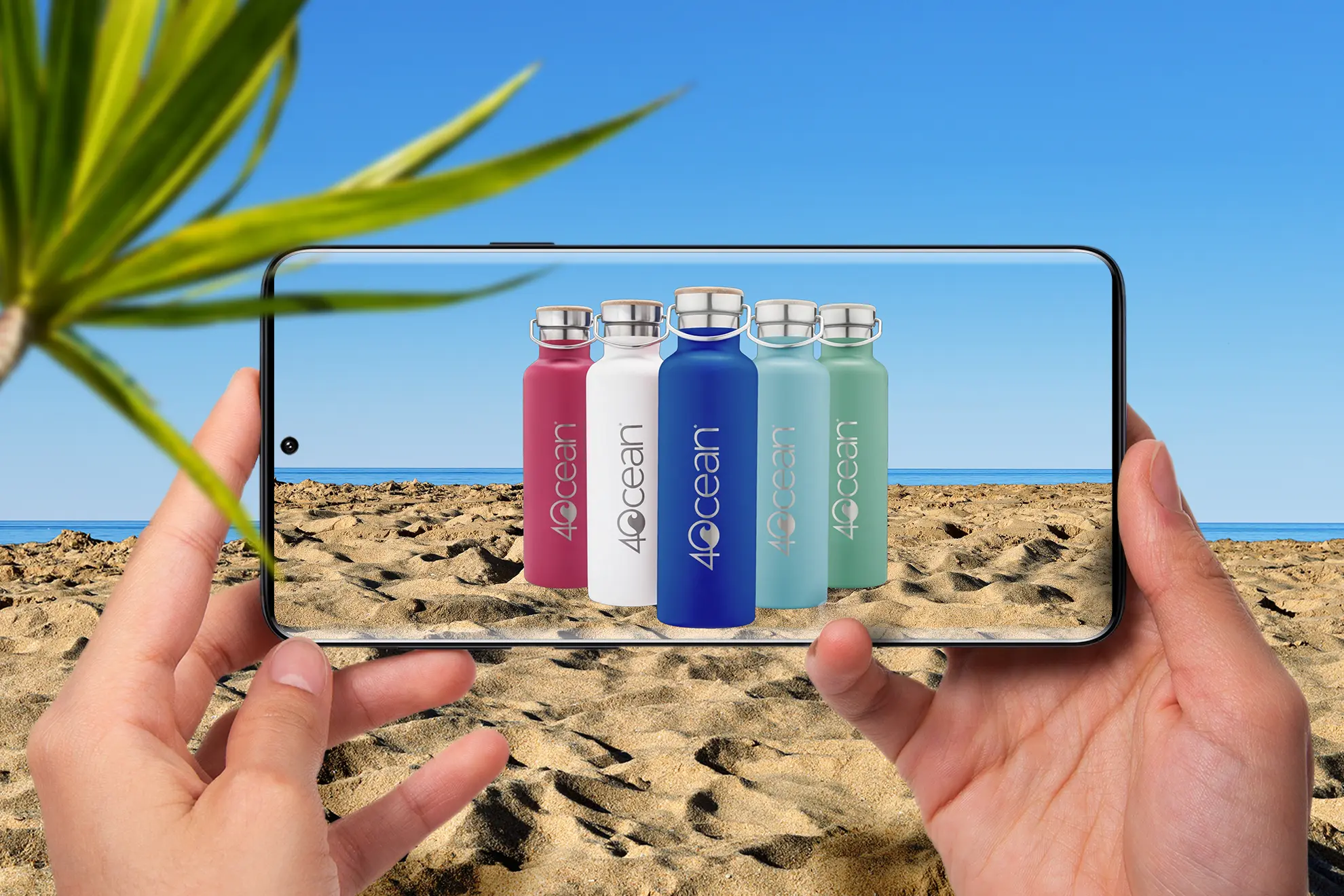 a hand holding a cell phone with a group of 4Ocean water bottles on the beach | Top Lead Generation Agency