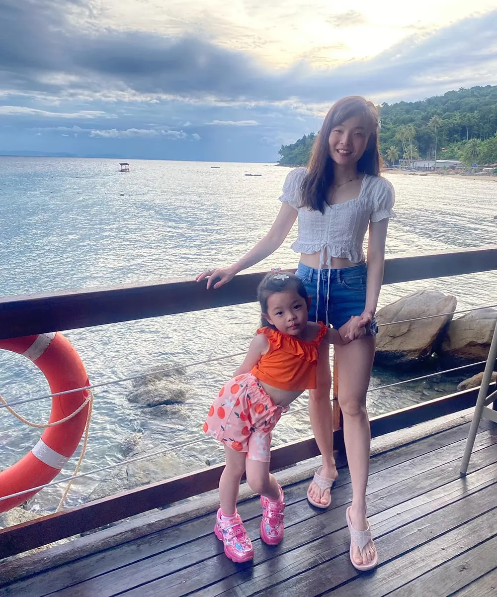 a person and a child posing for a picture | Top Lead Generation Agency